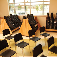 Wenger musician chairs in a rehearsal room with cello and bass racks