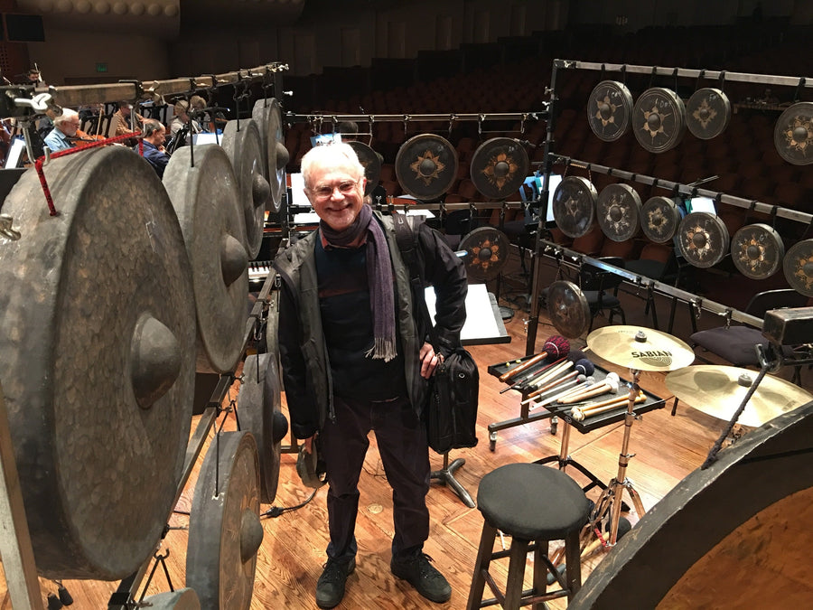 Cal Perc LA tuned gong set and tam-tams staged for an orchestra rehearsal, gongs racked in chromatic order behind the percussion station