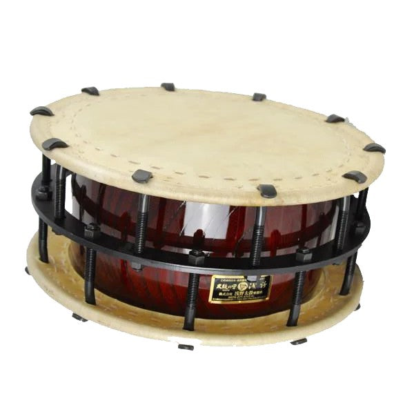 Bolt-tuned shime taiko with lacquered red shell and rawhide heads, shown in playing orientation