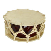 Rope-tuned shime taiko with hemp cord lacing and lacquered red shell, shown in playing orientation